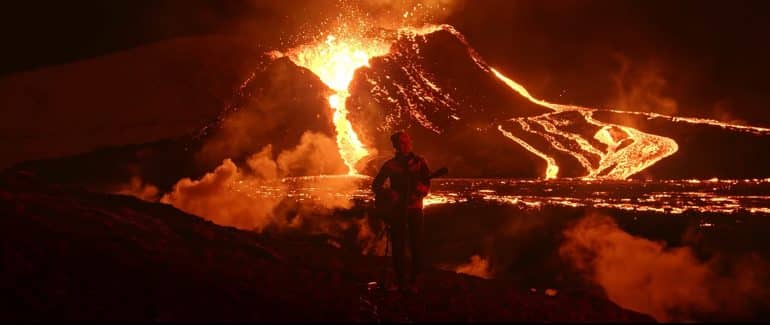 Member of Icelandic band Kaleo in front of a volcano