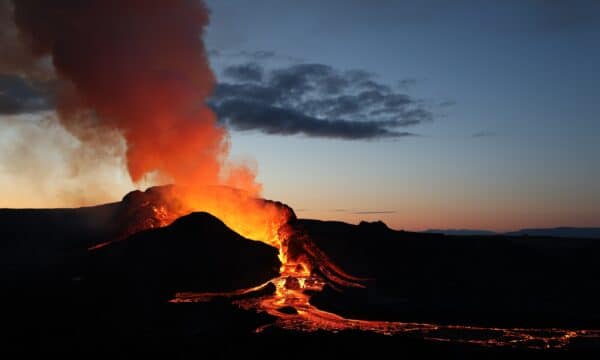 Erupting volcano in Iceland at twilight