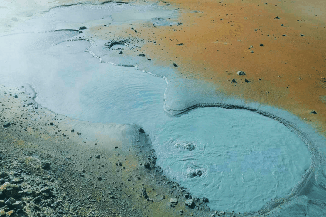A bubbling mud pool at Seltún Geothermal Area on Iceland's Reykjanes Peninsula.