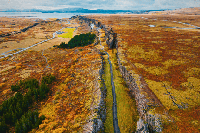 Aerial footage of Almannagja Canyon in Thingvellir National Park, Iceland. Autumn colors.