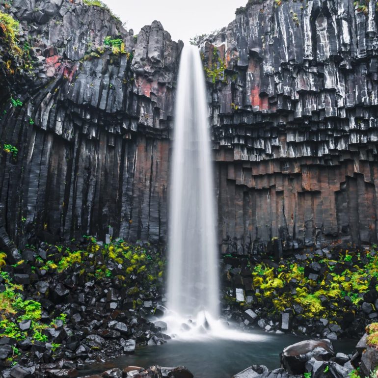 Svartifoss Waterfall, surrounded by black basalt columns, South Iceland.